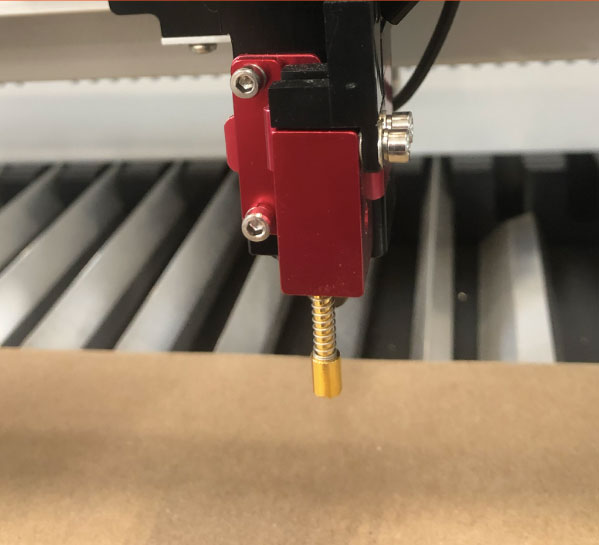 piece of wood under laser head