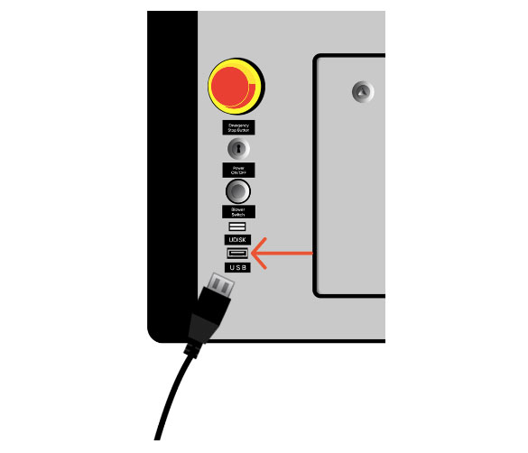 USB cable plugged into laser