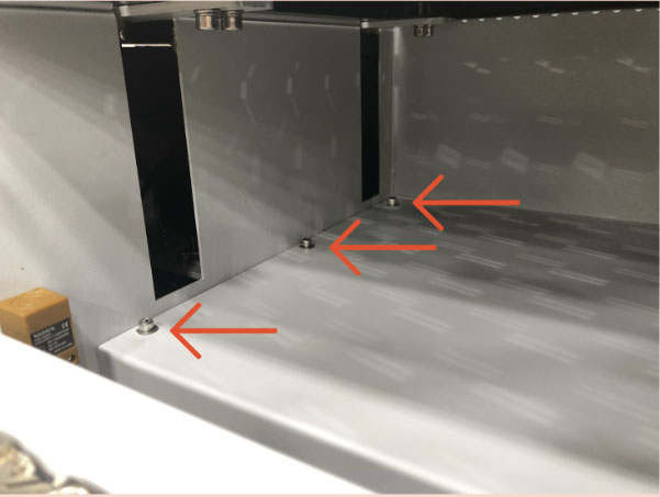 Bottom access panel with arrows pointing at 3 Allen screws
