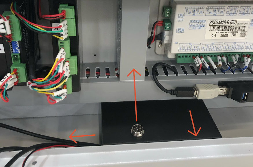 Super Box affixed to bottom of cabinet
