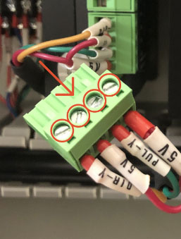 Loosen screws on the terminal block and remove the wires