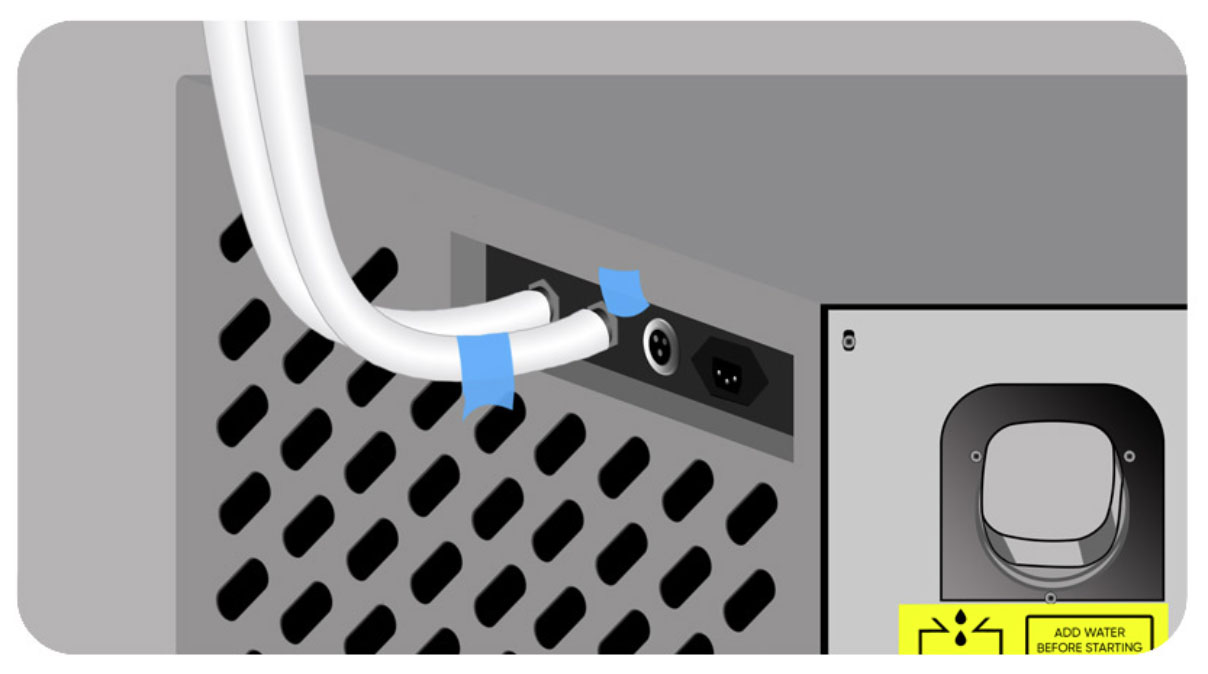 Piece of masking tape around one of the hoses, second piece of tape on the side of the chiller