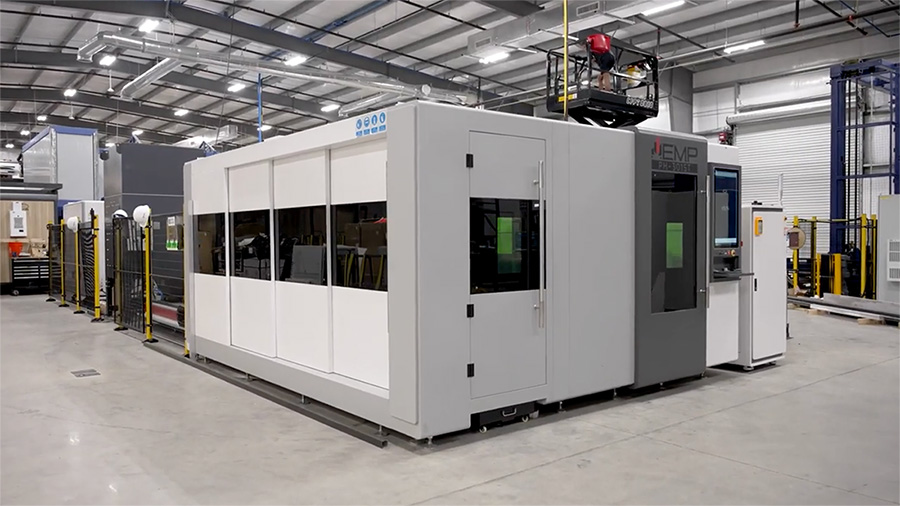 EMP Warehouse, view inside of a large industrial fiber laser cutter